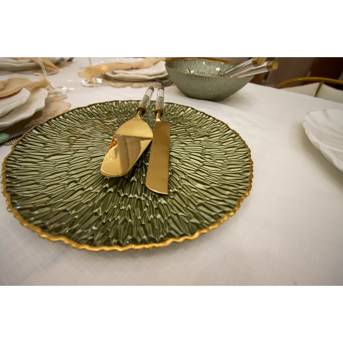 Gouden taart en messchop met transparant handvat