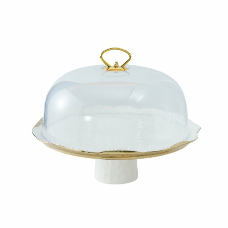 Witte porselein cake bel gouden randen met taartschop